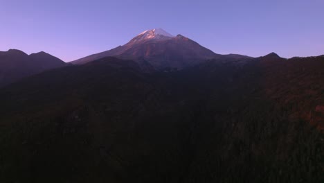 Aerial-traveling-video-of-the-Pico-de-Orizaba-volcano-and-a-big-ravine-in-the-middle