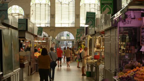 Famous-Central-Valencia-Marketplace,-Spain,-Early-morning-people-shopping