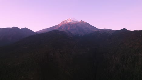 Aerial-footage-of-a-volcano-landscape-before-sunrise