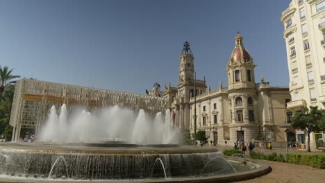 Town-hall-square-fountain-in-Valencia,-Spain-at-Summer-day