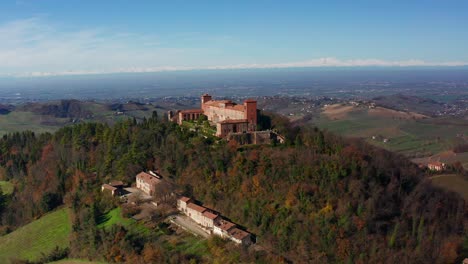 Aerial-View-Over-Castle-of-Montalto-Pavese-On-Hilltop