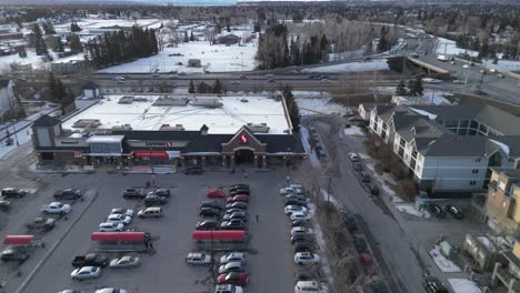 Safeway-in-Marda-Loop,-Calgary-is-seen-from-a-aerial-drone-view-while-under-renovations