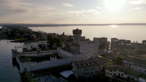 Aerial-view-Sirmione-mediteranean-historical-sightseeing-town-in-italy-on-lake-garda