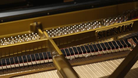 Inside-of-a-piano-playing-in-slow-motion-in-4k