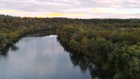Phoenixville-Schuylkill-River-4k-Drone-in-Golden-Hour-during-Fall-Autumn-flying-over-river