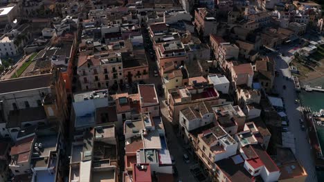 Aerial-Overhead-Flying-Over-Castellammare-Del-Golfo-Town-Rooftops