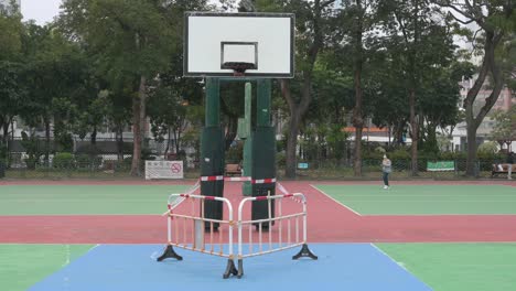 An-empty-colorful-basketball-court-is-seen-at-a-closed-playground-due-to-Covid-19-Coronavirus-outbreak-and-restrictions-in-Hong-Kong