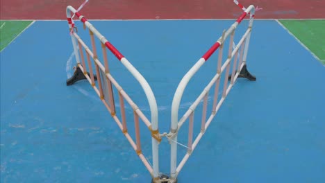 A-view-of-a-colorful-basketball-court-blocked-by-barriers-at-a-closed-playground-due-to-Covid-19-Coronavirus-outbreak-and-restrictions-in-Hong-Kong