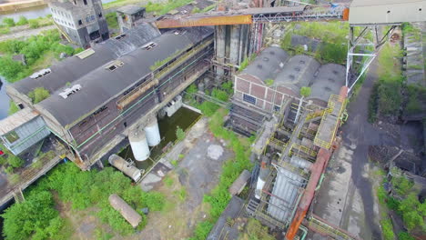 Aerial-drone-footage-of-a-closed,-abandoned-coke-coal-factory-Carsid-in-Charleroi