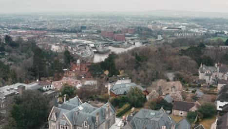 Aerial-drone-shot-over-Clifton-revealing-Bristol-over-the-River-Avon,-during-overcast-cloudy-day