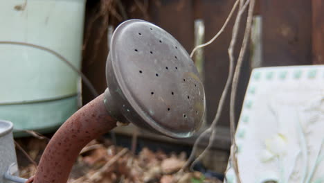 Close-up-of-rusty-watering-can-spout