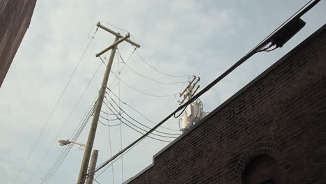 Power-Pole-Between-Two-Buildings-Looking-Up