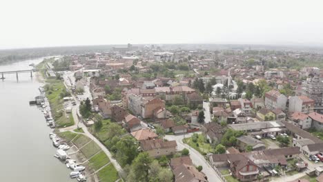 Forwarding-the-drone-to-film-beautiful-river-Sava-in-small-city-Brcko-district-in-Bosnia-and-Herzegovina,-very-nice-and-log-coast