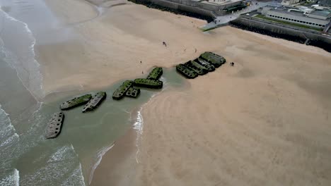 Aerial-view-of-town-of-Arromanches-les-Bain-in-Normandy-France-with-WW2-bunker-ruins
