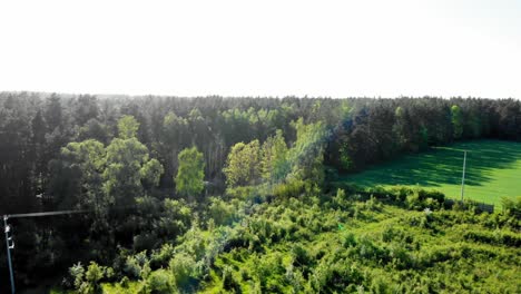 Aerial-dolly-shot-of-a-meadow-in-pomeranian-district-in-Poland