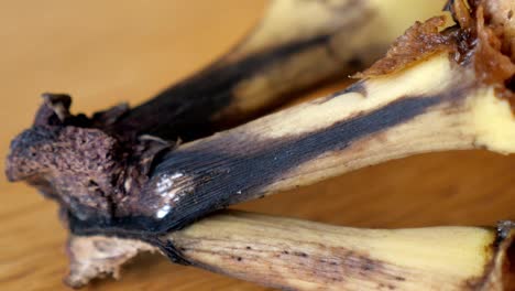 Rotten-brown-bio-fruit-banana-in-close-up-which-is-a-bad-waste-of-food