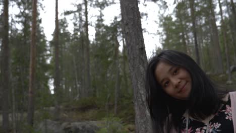 Girl-smiling-deep-in-the-forest