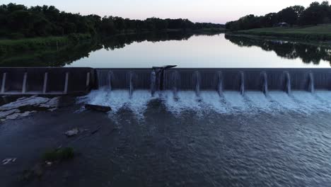 Aerial-drone-video-of-a-dam-on-the-Pedernales-River-at-dusk