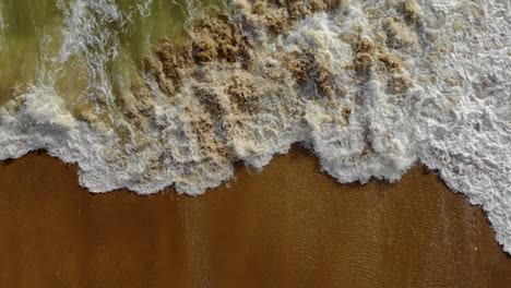 Foam-of-Waves-Crashing-on-the-Beach