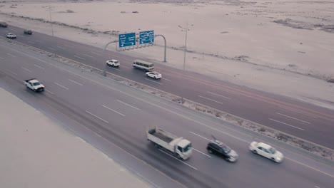 Desert-Highway-Traffic-Aerial-Footage-–-Highway-Sign