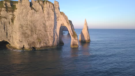 Aerial-footage-of-the-beautiful-French-coastline-along-the-village-of-Étretat