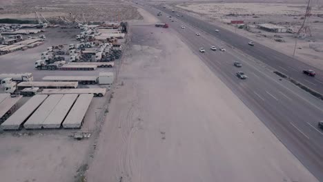 Industrial-Vehicle-Yard-with-Desert-Highway