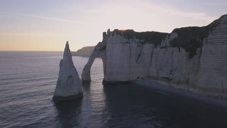 Aerial-footage-of-the-beautiful-French-coastline-along-the-village-of-Étretat