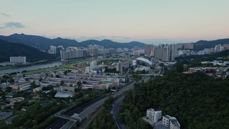Establishing-Aerial-Drone-of-Hong-Kong-Racecourse-and-Fo-Tan-Road-in-Sunrise