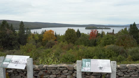 Aerial-flyover-shot-of-the-Scenic-Overlook-at-Rangeley-Lake,-Maine