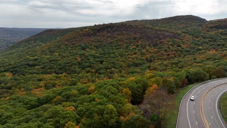 An-aerial-view-above-the-mountains-in-upstate-NY-during-the-fall-foliage-changes