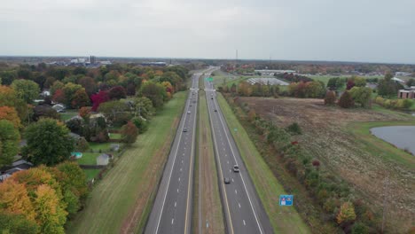 Drone-footage-of-highway-near-small-town