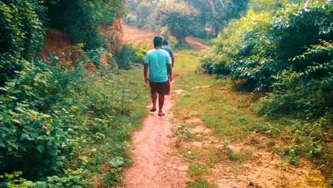 Indian-two-village-boy-walking-in-the-forest