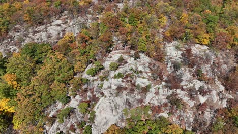 An-aerial-view-high-above-the-mountains-in-upstate-NY-during-the-fall-on-a-beautiful-day