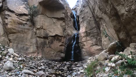 Beautiful-narrow-waterfall-on-peruvian-rocky-mountain