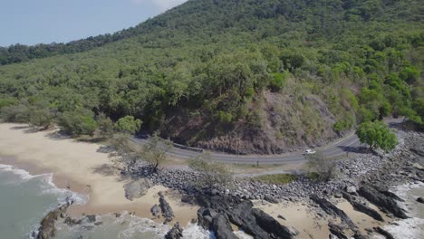 Captain-Cook-Highway-At-Ellis-Beach-With-Rocky-Outcrops-In-Summer