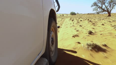 Close-of-wheels--off-road-vehicle-Namibia-dessert