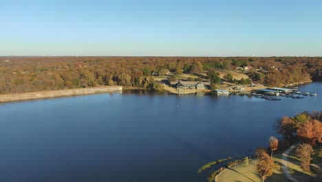 Early-evening-aerial-view-around-the-bend-past-the-retirement-community-lake-marina-club-house