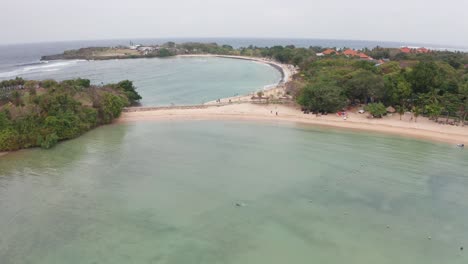 Beautiful-Nusa-Dua-Beach-in-Bali-Indonesia,-drone-flyover-filming-in-4k