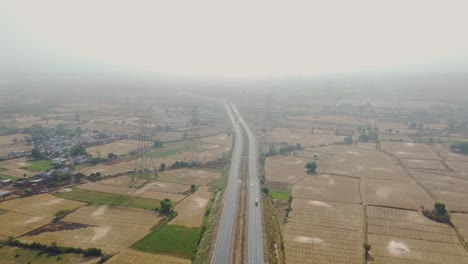 Aerial-Drone-shot-of-a-Highway-road-in-Central-India-,-Gwalior
