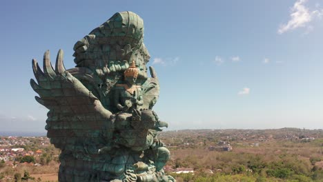 Garuda-Wisnu-Kencana-Cultural-Park-flying-around-object-building-close-up-perspective