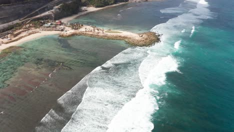 Pantai-Pandawa-beach-amazing-flyover-Bali-Indonesia-surfers-beach-and-paragliding-adventure-dreamland