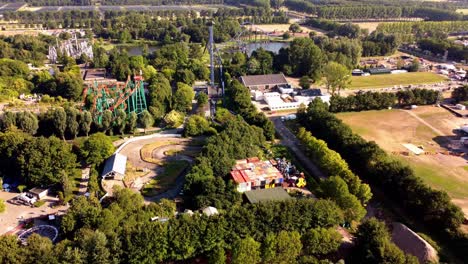 Aerial-videography-of-Walibi-Holland,-a-theme-park-in-Biddinghuizen,-Netherlands