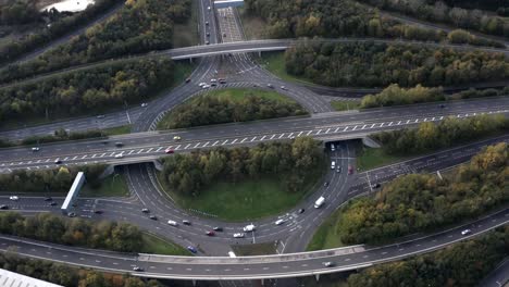 Police-helicopter-style,-bird's-eye-view-of-a-busy-ring-road,-fast-cars-overtaking-|-Edinburgh,-Scotland-|-4K-at-30fps