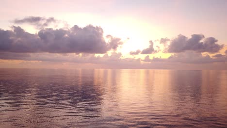 Cinematic-4K-Tilt-Up-of-Sunset-on-Waves-of-Indian-Ocean-in-Bay-of-Bengal,-Andaman-Islands,-India