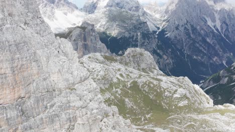 Alpinist-descending-rugged-Torre-di-Toblin-via-ferrata