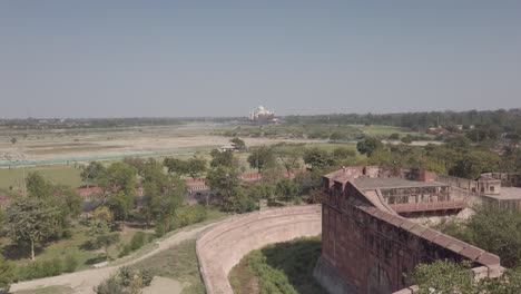 Move-through-Window-to-Reveal-Taj-Mahal-in-Distance-in-Delhi