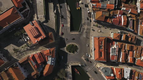 Aerial-Top-down-shot-over-Landmark-downtown-waterway,-Aveiro