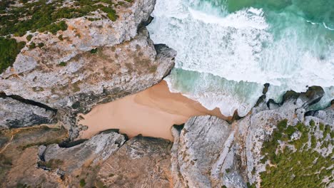 Tropical-beach-aerial-view,-Top-view-of-breaking-waves-on-tropical-beach