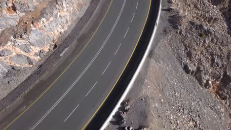 Concrete-Road-Constructed-In-The-Mountains-Of-Jebel-Jais-Ras-Al-Khaimah-UAE---Wide-Shot