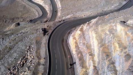 Drone-Flying-Over-The-Desert-Mountain-Road-At-Jebel-Jais-Mountain-In-United-Arab-Emirates---Aerial-Shot